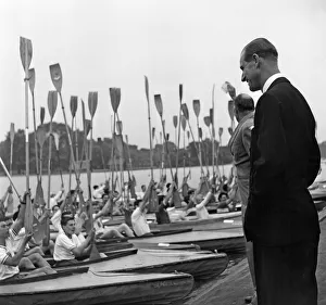 The Duke of Edinburgh reviews the canoes of the Boys Clubs of London at The Serpentine