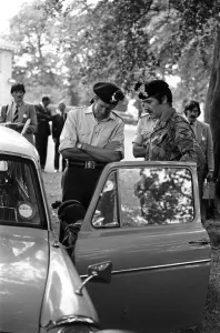 00006 Prints: Duke Of Kent Visits Northern Ireland June 1980 The Duke watching a car being