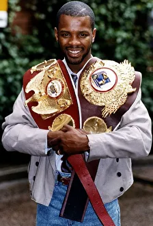 Duke McKenzie Boxer with IBF world championship belt {left}