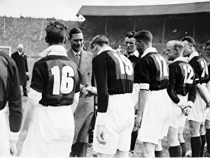 Duke of York shaking hands with the Manchester City Football team before the 1933 FA Cup
