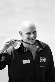 Duncan Goodhew swimmer takes part in medal ceremony after winning gold medal in Men