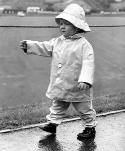 Durham Miners Gala - Young Andrew Mangan is prepared for the wet weather in his