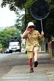Safari Suit Prints: Dylan Dronfield - reporter dressed in safari clothes - big game hunting