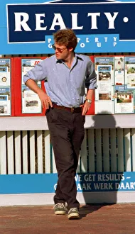 South Africa Prints: Earl Spencer looks in the Windows of the estate agents in South Africa