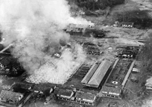 00073 Prints: East Coast of Kra Isthmus. Chumpon railway station and shipment yard left in a mass of