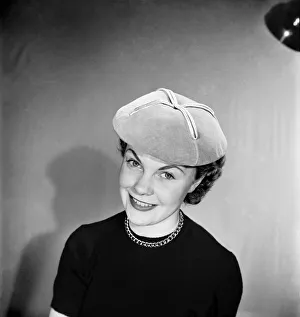 00023 Prints: Easter Hat fashion The hot cross bun. March 1953 D1430