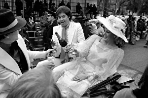 Easter Parades Prints: The Easter parade, Battersea Park. Film star Carol Baker gets a drink of champagne before
