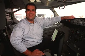 00058 Prints: Easyjet owner Stelios Haji-Loannou sitting at aeroplane controls October 1997