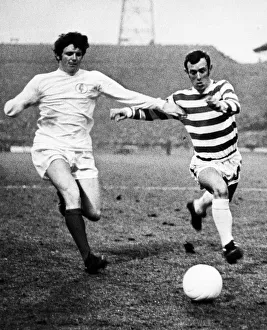 Eddie Gray of Leeds and Bobby Lennox of Celtic battle for possession