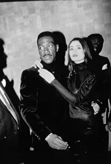 Eddie Murphy Actor / Comedian with actress Charlotte Lewis star of the Golden Child