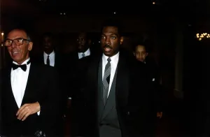 Comedians Prints: Eddie Murphy Comedian and Actor with his Bodyguards at Video Awards