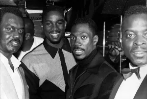 Eddie Murphy Comedian Actor with Lennox Lewis Boxer at the Moonlighting Nightclub in