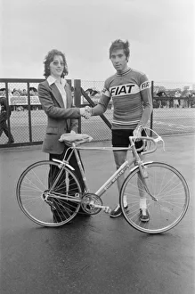 Belgium Prints: Eddy Merckx (right) presents n Eddy Merckx cycle to Daily Mirror competition winner