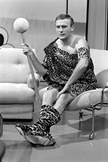 Leopard Prints: Edward Woodward rehearses for a sketch to be aired for a Christmas TV Show on Thames
