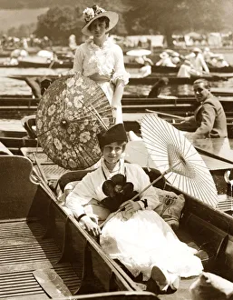 1914 Prints: Two edwardian ladies enjoying the sun and the river at the Henley Regatta Women