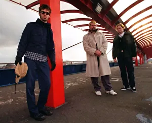 Indie Prints: The Eels pop group standing in covered walkway Scottish Exhibition Centre 1997