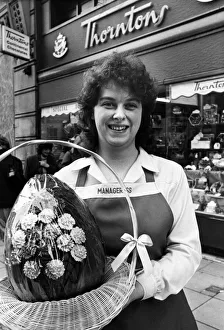 Sweets Prints: Eggstravagance? Rosalyn Beck, Thorntons Manageress, gets her hands - but not her mouth