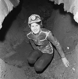 Eillen Davies seen here making her way thorough a series of caves under the Brecon