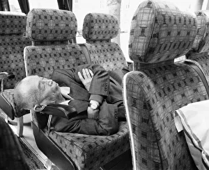 A elderly Japanese tourist finds walking around historic London to much