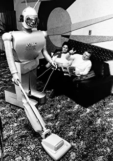 Domestic Life Prints: Electronic designer Ben Skora Palos Hill Illinois and his wife relax as the result of six