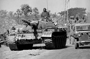 Tank Prints: Elements of the victorious Indian army enter Kulna following the surrender of