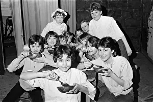 Eleven-year-old Ayshea Munsi as iverwith the other workhouse boys during a production