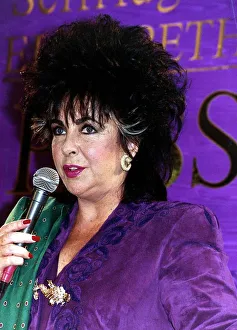 Beauty And Cosmetics Prints: Elizabeth Taylor Actress at a Business conference on perfume October 1989