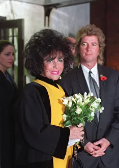 ELIZABETH TAYLOR, ACTRESS, WITH HER HUSBAND LARRY FORTENSKY - 11 / 06 / 1991