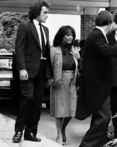 Elizabeth Taylor Actress with her son Christopher as they walk hand in hand