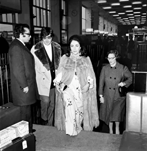 Elizabeth Taylor with Henry Wynberg seen here arriving at Heathrow Airport