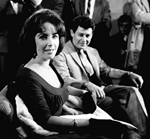 Elizabeth Taylor with Husband Eddie Fisher arrive at London airport. 26th May 1959