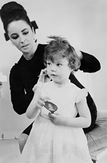 Core54 Prints: Elizabeth Taylor June1964 Combs adopted daughter maria