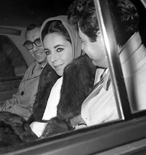 Elizabeth Taylor Nov 1960 with Husband Eddie Fisher leaving London Clinic