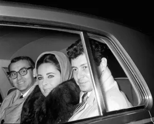00028 Prints: Elizabeth Taylor November 1960 with Husband Eddie Fisher Leaving London Clinic