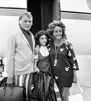 Elizabeth Taylor and Richard Burton with daughter Liza leave London Airport (Heathrow