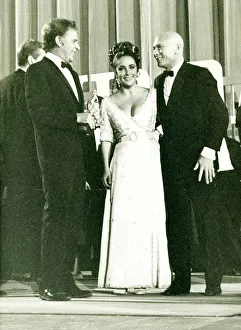 Men And Woman Prints: Elizabeth Taylor and Richard Taylor and Yul Brynner at the Italian Oscars at Taormina