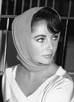 Head Scarf Prints: Elizabeth Taylor Sept 1959 seen here in the departure lounge of London Airport