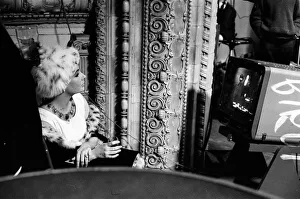 Poetry Prints: Elizabeth Taylor on the set where Richard Burton is filming a poetry programme for