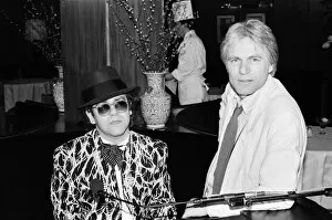 Images Dated 1st January 1985: Elton John and Adam Faith at The Savoy, London. 1985
