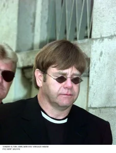 Elton john arrives at Gianni Versace memorial 22 / 07 / 97. The service was held in Italy