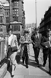 Pianist Prints: Elton John arriving at court. Elton is asking for a bigger share of the 20 million his