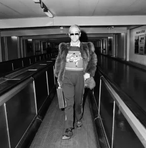 Elton John, flies off to Toronto, Canada from Heathrow Airport, London