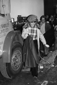 Elton John leaving the Empire Pool Wembley by the back door after he announced his