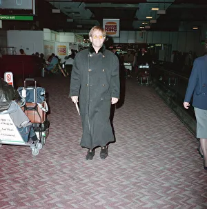 Elton John leaving Heathrow Airport on Concorde for New York