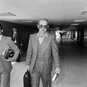 Elton John leaving Heathrow Airport for Helsinki where he will be for one day to watch
