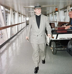 01337 Collection: Elton John at London Airport. 29th July 1988