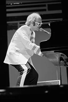 Pianist Prints: Elton John performing on stage, during the Elton John and Ray Cooper concert tours