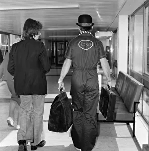 Elton John pictured on his arrival from a recording session in Los Angeles