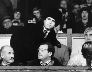 Elton John Pop Singer And Chairman Of Watford Football Club Sits In His Seat Before