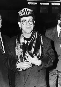 Elton John pop Star leaving Heathrow airport for Toronto to visit friends in Canada